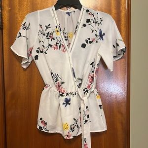 Sienna Sky-  blouse with flare sleeves, white white colorful flowers